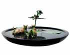 EL36 <br> 
Krishna in a Lotus Pond – II <br>
Bronze on Granite <br>
26 x 27 x 13 inches <br>
Available